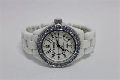 chanel j12 white ceramic blue sapphire bezel h1180|Chanel j12 diamonds.